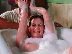 Mia kirshner flashes her boobs